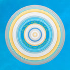 Circular design with concentric rings and motivational text on a blue background